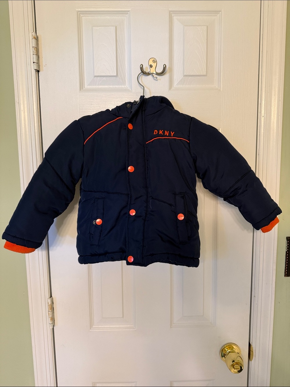 DKNY Kids Navy Puffer Jacket with Orange Accents